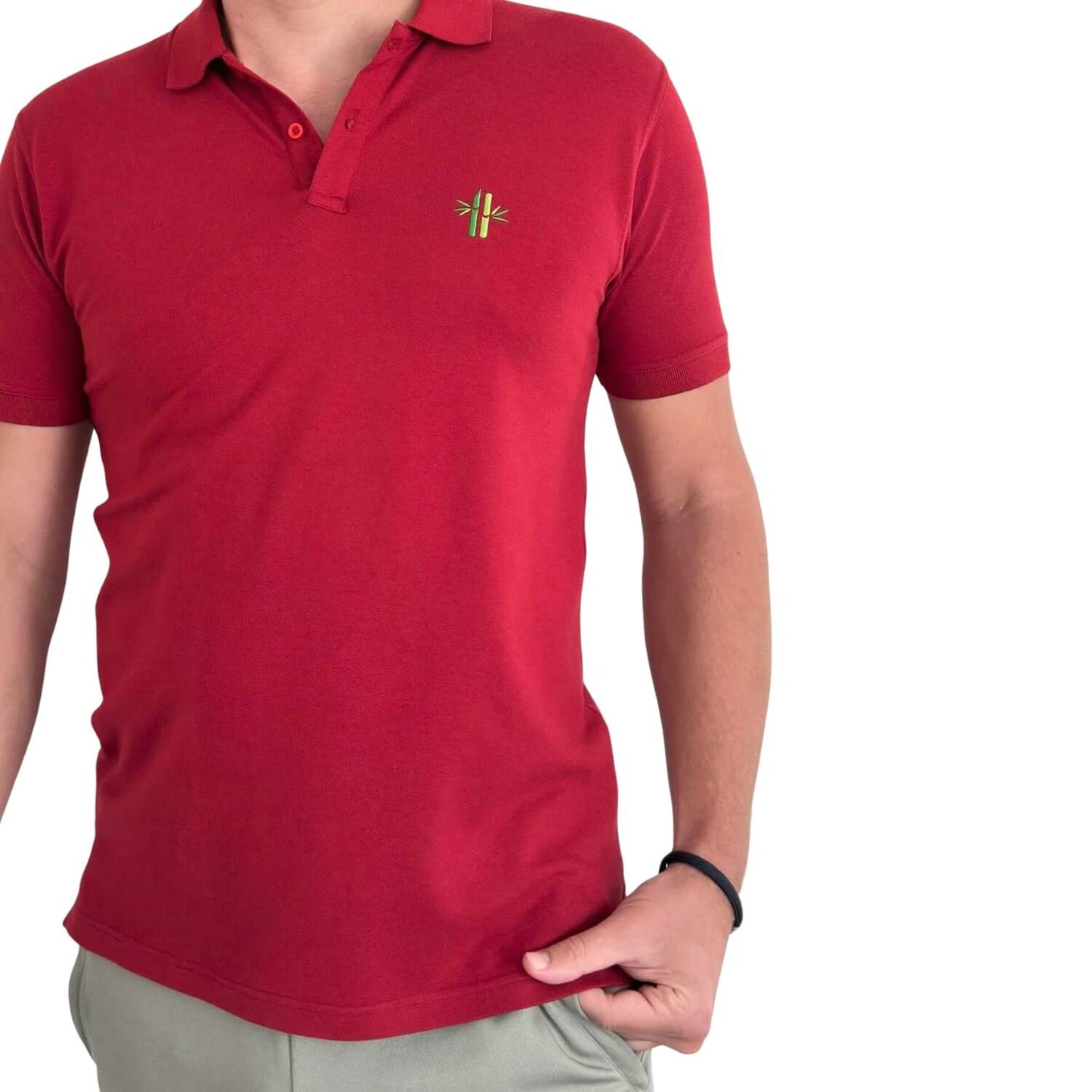 Close up of model wearing Pique Bamboo Cotton Polo in Rust Red -
