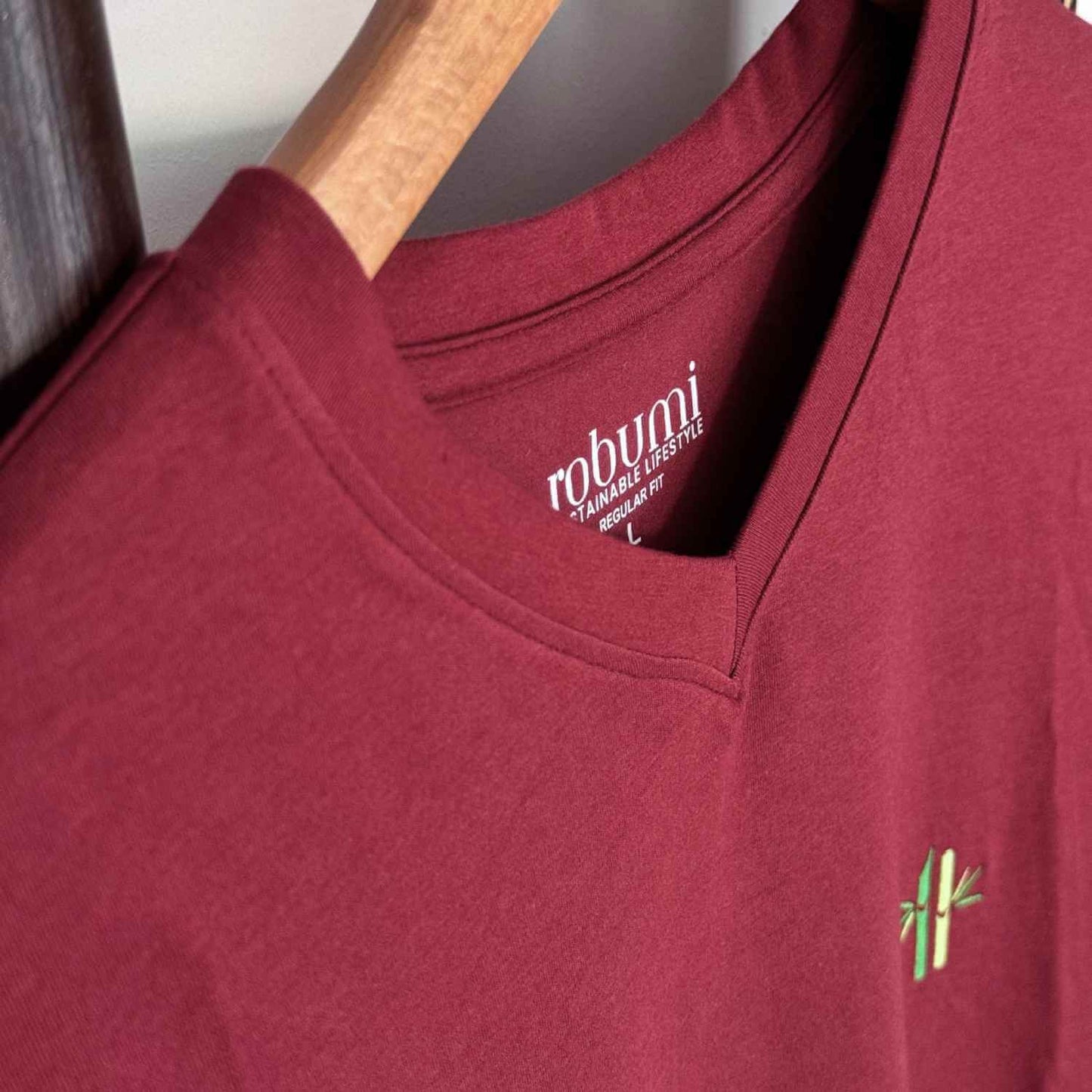 Side view of hanging bamboo cotton v-neck shirt in Rosewood Red - Robumi Lifestyle