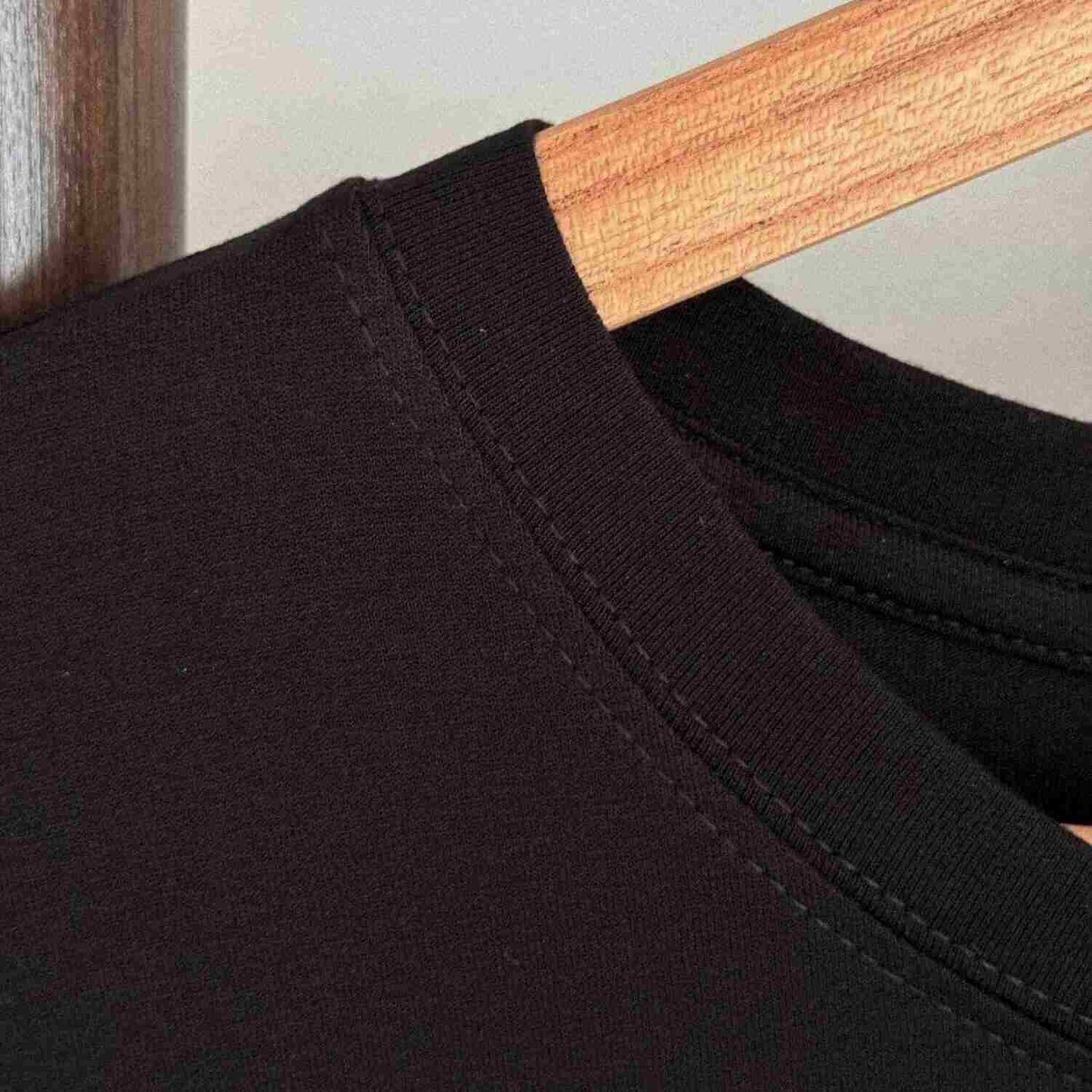 Close up of stitching of neck seam on Everyday Bamboo Crew Neck Shirt | Pitch Black - Robumi Lifestyle