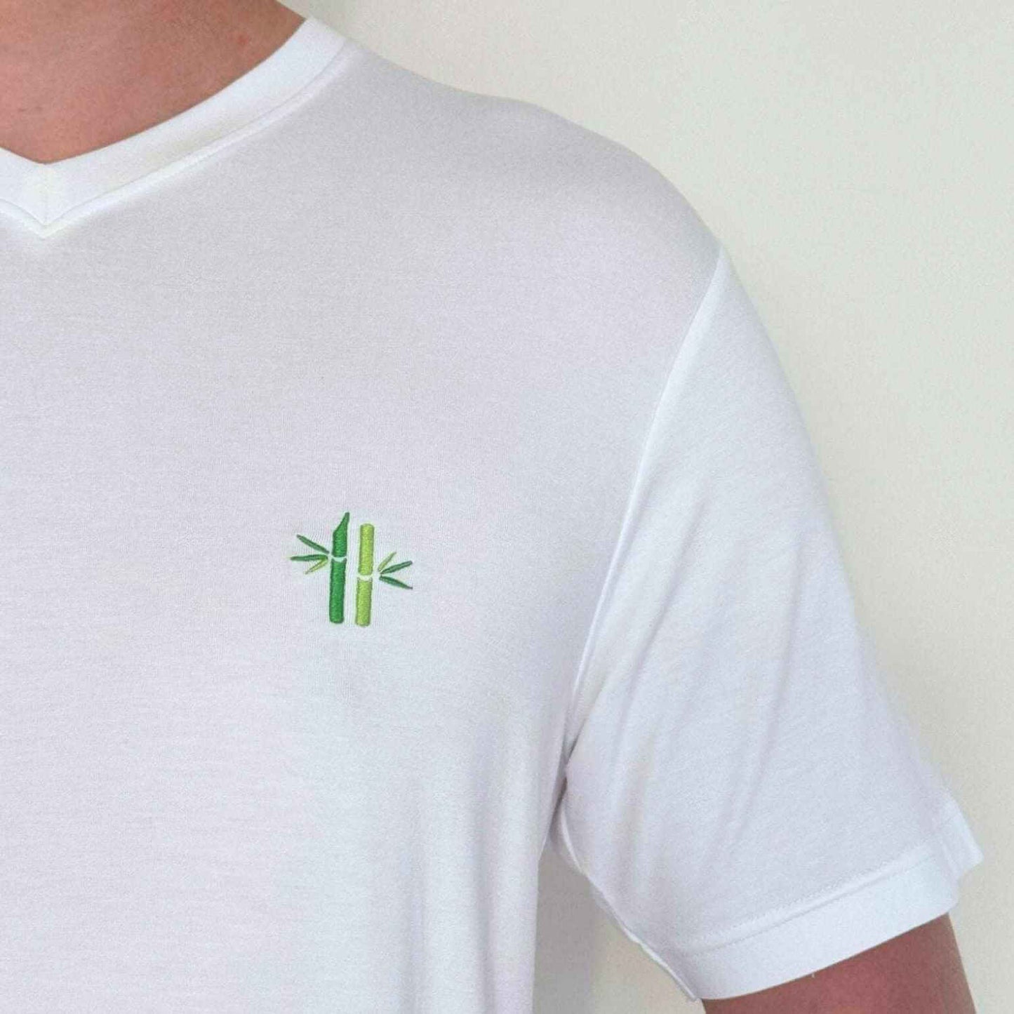 Close up of bamboo embroidery, neck and sleeve of Everyday Bamboo V-neck shirt | Bright White - Robumi Lifestyle
