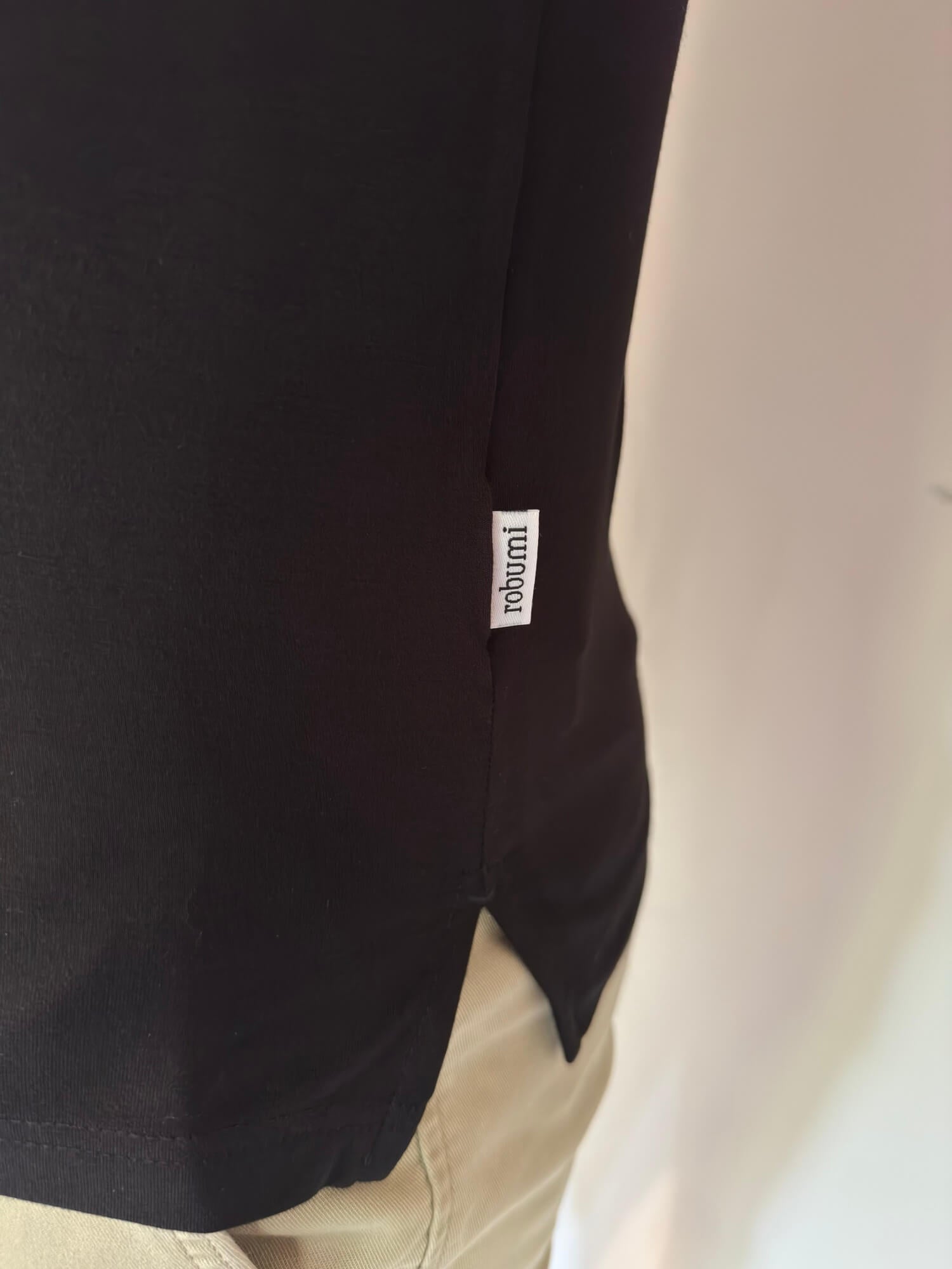 Side label on Athletic Bamboo Polo in black - Robumi Lifestyle