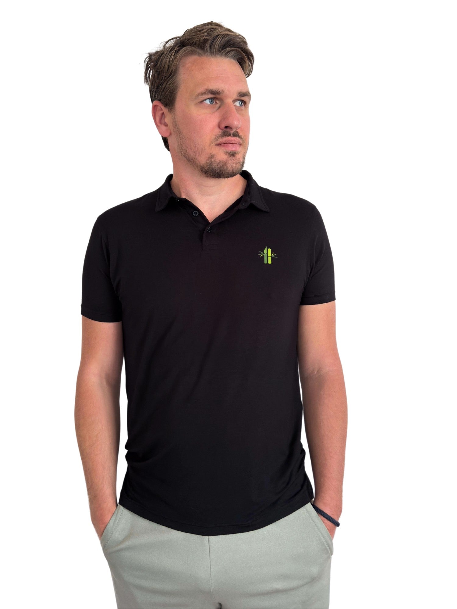 Model wearing an Athletic Bamboo Polo in black - Robumi Lifestyle