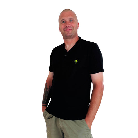Model wearing an Athletic Bamboo Polo in black - Robumi Lifestyle