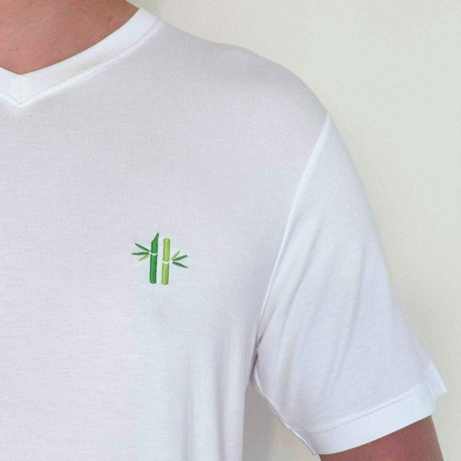 Close up of bamboo embroidery, neck and sleeve of Everyday Bamboo V-neck shirt | Bright White - Robumi Lifestyle